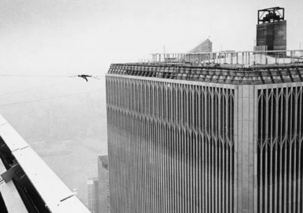 philippe petit laying on wire